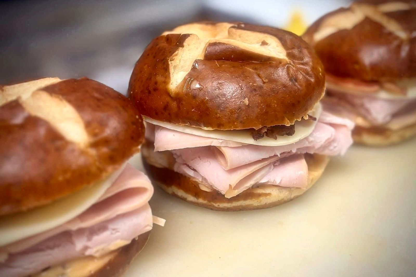 Sandwiches on pretzel buns
